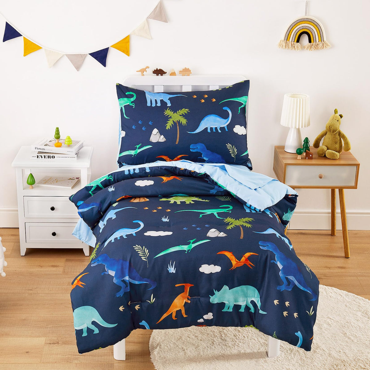 Wake In Cloud - Toddler Bedding Set for Boys, Colorful Jurassic Dinosaur Volcano, 4 Pieces Soft Crib Bed Set Including Comforter, Sheets and Pillowcase, Light Blue